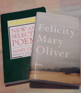Two books of Mary Oliver's poetry: "New and Selected Poems" and "Felicity."
