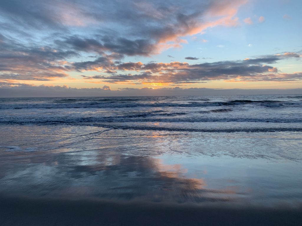 Photo of beach at dawn